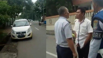 menantang petugas dishub