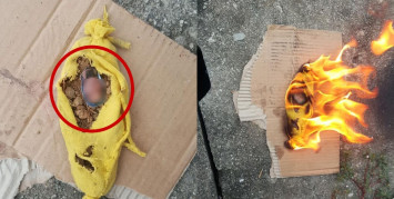 kain kuning berisi tanah dan foto korban santen. Image via siakapkeli.my