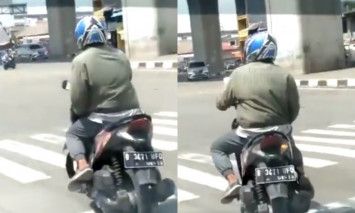 atraksi tak turunkan kaki saat di lampu merah