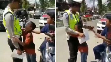 Anak kecil kena tilang