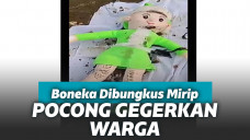 Boneka dibungkus mirip pocong