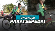 Driver gojek pakai sepeda