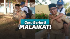 Guru gendong murid patah kaki