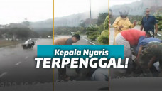 Pemotor kecelakaan karena jas hujan