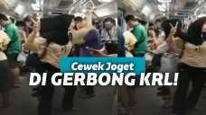 Wanita joget di kereta