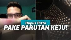 Memarut tangan untuk menghilangkan tato