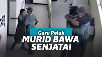 Guru peluk murid yang bawa senjata