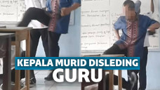 Guru sleding kepala murid