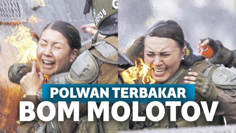 Polwan terbakar bom molotov di Chile