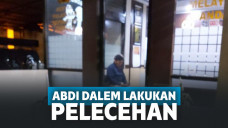 Pelaku saat dibawa ke kantor polisi