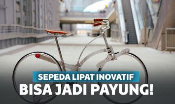 Sepeda lipat bisa jadi payung