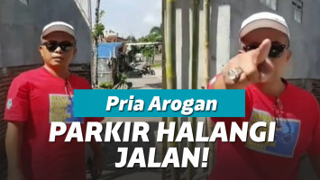 Pria parkir sembarangan