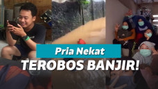 Terobos banjir demi teman