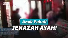 Anak menarik paksa jenazah ayahnya dari peti mati