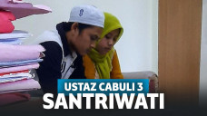 Pelaku saat ditemani sang istri di kantor polisi
