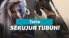 Wanita penuhi tubuh dengan tato