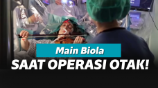 Wanita operasi otak sambil main biola