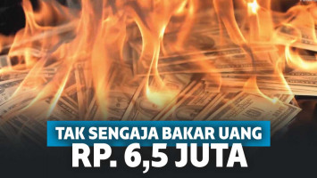 Ilustrasi uang terbakar