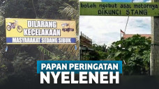 papan peringatan unik