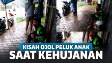 Meringkuk Kehujanan Sambil Peluk Anaknya, Driver Ojol Ini Viral hingga Dicari Kapolres Jember