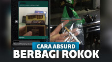 Terpisah karena Karantina, Dua Pria Ini Berbagi Rokok dengan Cara yang Bikin Netizen Geleng-Geleng Kepala