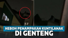 Kuntilanak di atas genteng