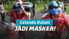 Memakai masker dari celana dalam