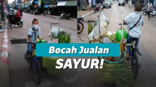 Dong Sedang Berjualan Sayur