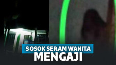 Sosok wanita mengaji di gedung kosong