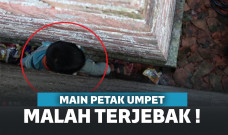 Bocah Ini Malah Terjebak Di Celah Dinding