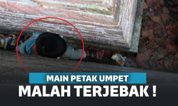 Bocah Ini Malah Terjebak Di Celah Dinding