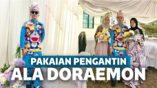 pengantin kenakan pakaian doraemon