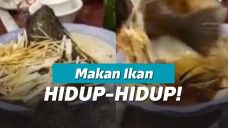 makan ikan hidup-hidup