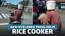 Viral Pria Naik Motor Pakai Helm Rice Cooker, Netizen: Semoga Otak nggak Jadi Bubur