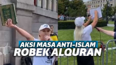 Wanita peserta aksi yang disebut merobek Al Quran