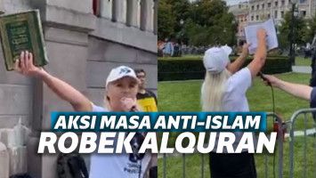 Wanita peserta aksi yang disebut merobek Al Quran