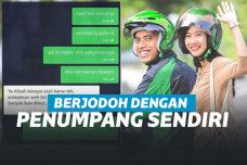 Driver ojek online dan penumpangnya.