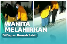 Wanita melahirkan di depan rumah sakit