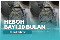 Bayi dicat jadi manusia silver