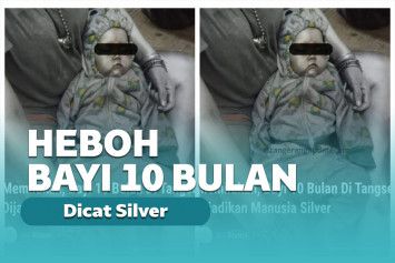 Bayi dicat jadi manusia silver