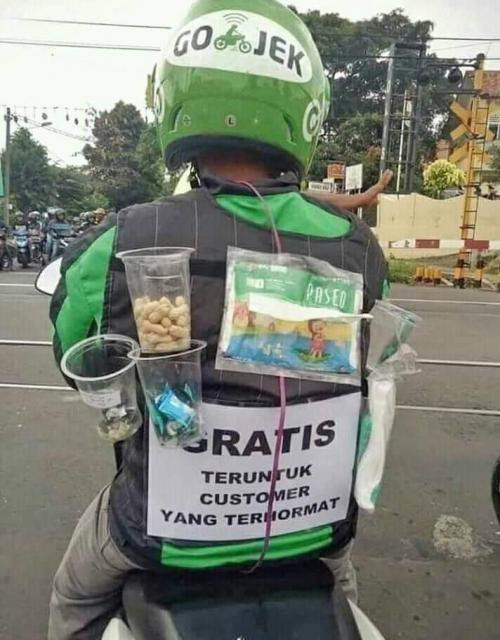 Ilustrasi ojek online berbagi