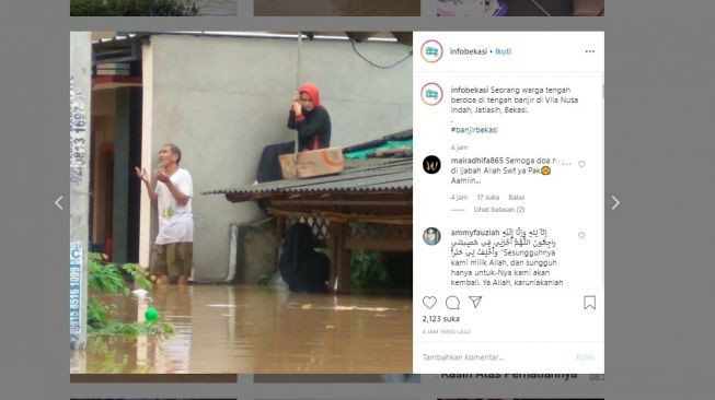 Berdoa di tengah banjir