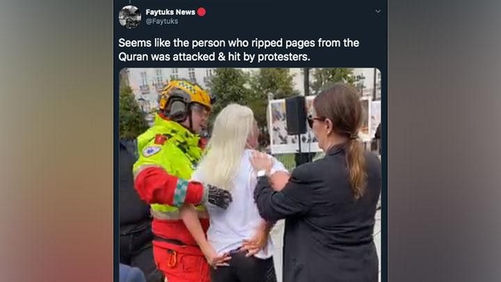 Wanita peserta aksi yang disebut merobek Al Quran